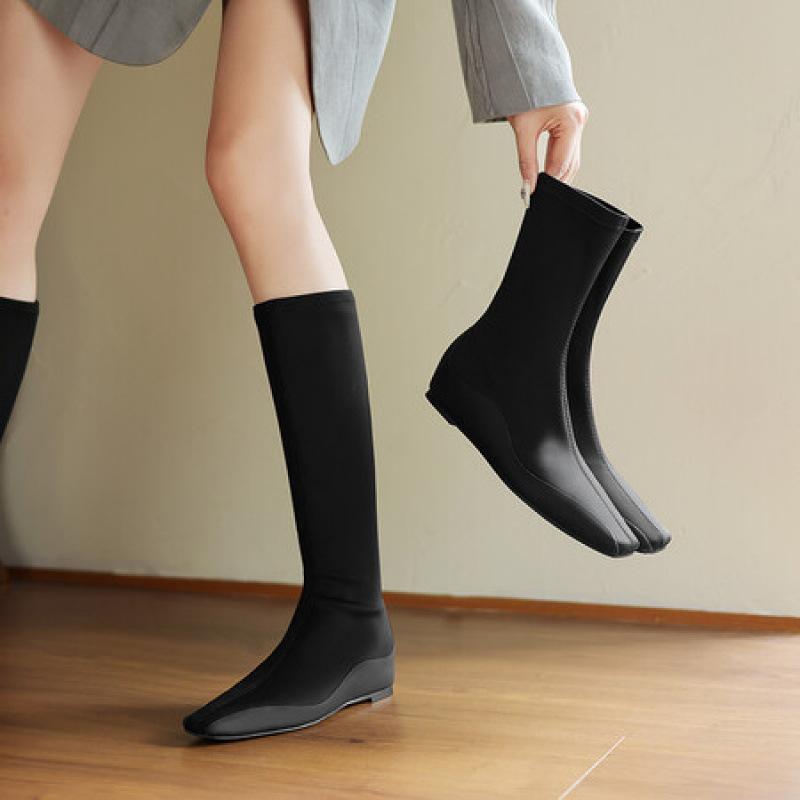Autumn and winter elastic high boots rubber sole wedge heel large size women's boots solid color sleeve new medium heel square head fashion boots