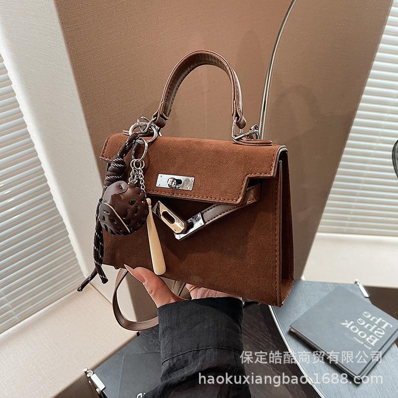 Neue Tasche Damen 2025 beliebte kleine quadratische Tasche Herbst und Winter Nischendesign Schulter Umhängetasche High-End Handtasche