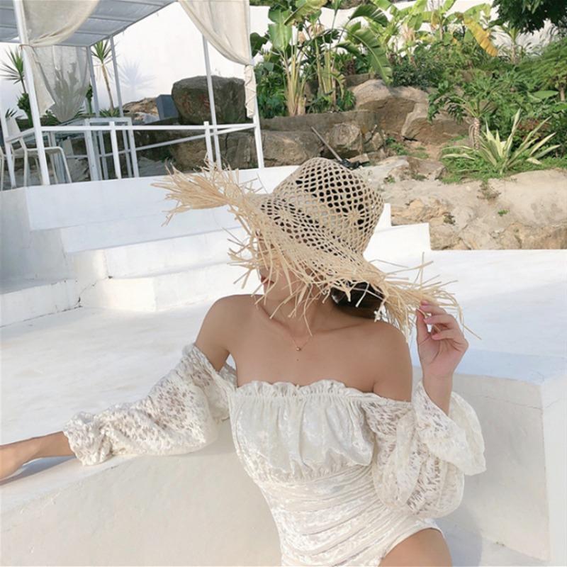 Summer straw hat hollow women's new beach hat photo sun hat women's big brim casual solid color rough edge Lafite straw hat