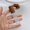 Szklana butelka na perfumy 9 ml z drewnianą nakrętką Puste wielokrotnego napełniania Atomizer do perfum w sprayu Pojemniki