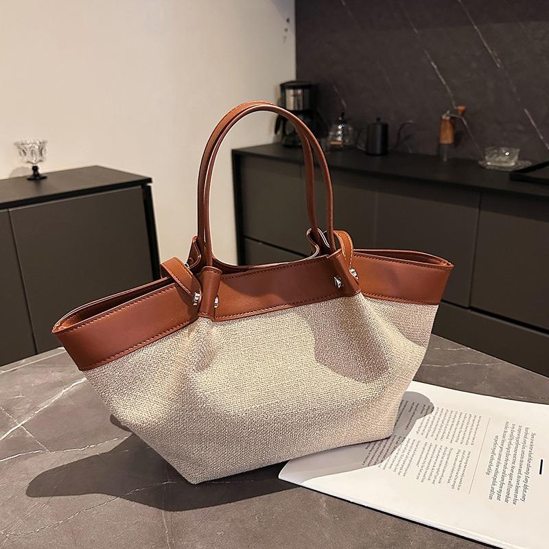 

Spring new retro portable shoulder bag niche design canvas splicing large capacity tote bag коричневий