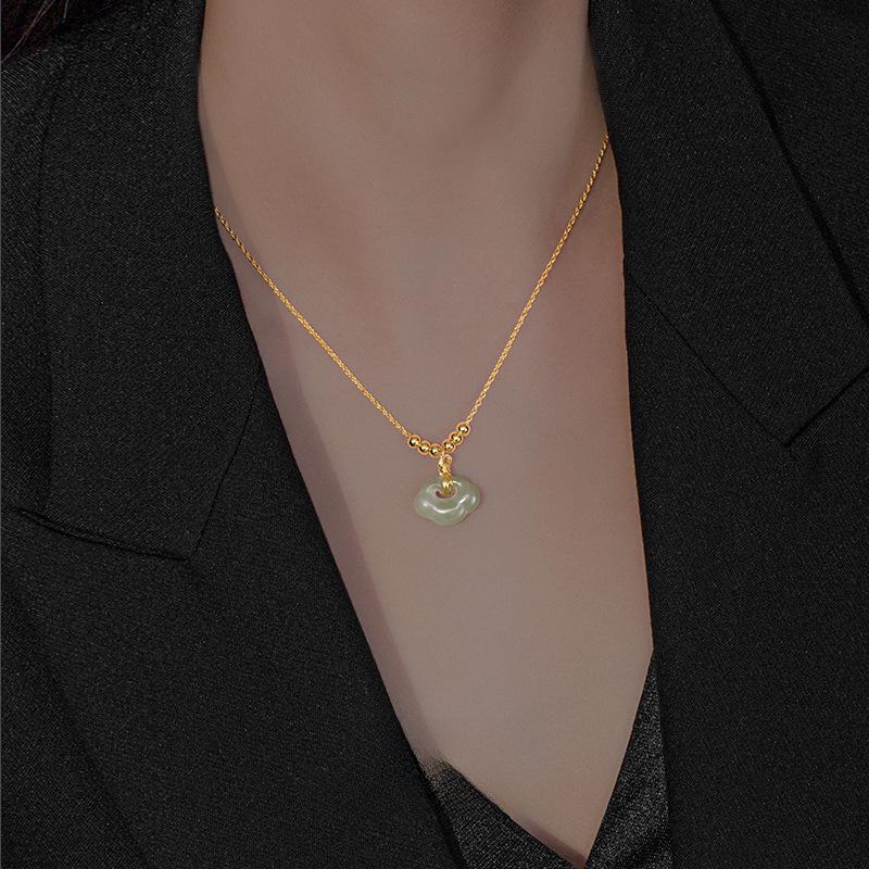925 Silver Peace Lock Necklace with Hetian Jade & 14K Gold Clavicle Chain, Featuring a Retro Ruyi Longevity Lock Pendant for Women.