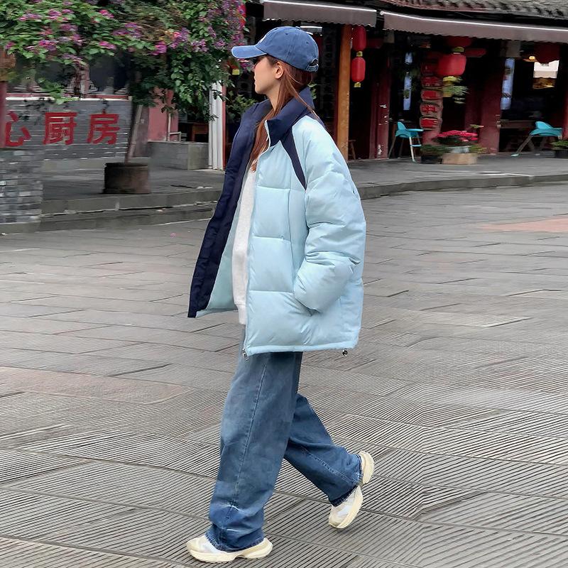 Wear stand-up collar cotton-padded clothes, women's winter thick coats, new men's and women's cotton-padded jackets, and bread clothes are trendy.