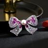 Women's Light Luxury Design Elegant Imitation Pearl Bow Brooch Simple Fashion Niche Design Sense Brooch Daily Accessories