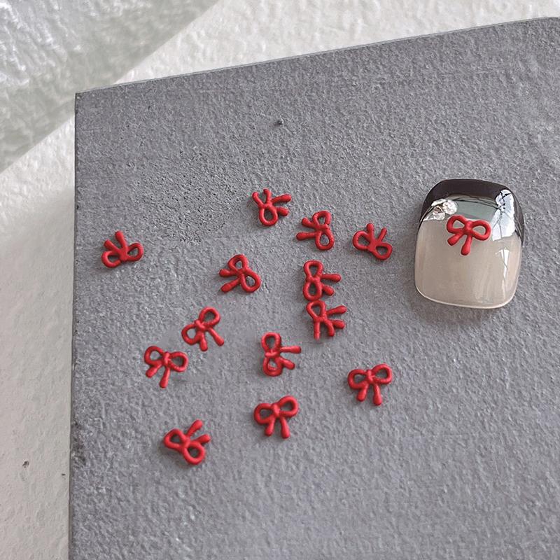 30 ks/sáček Mašličky Nail Art Mašličky DIY Ozdoby Mašle Designové Dílky Červené Roztomilé Manikúrní Potřeby