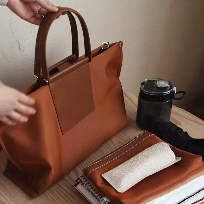 

Leather Patchwork Nylon Large-Capacity Tote Bag Women 2025 New High-Grade Sentong Qin Portable Shoulder Shoulder Briefcase Maple Leaf Orange