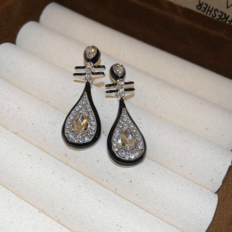 "Silver Needle Bamboo Fan Earrings: Butterfly Drop, Retro Fashion for Women"
