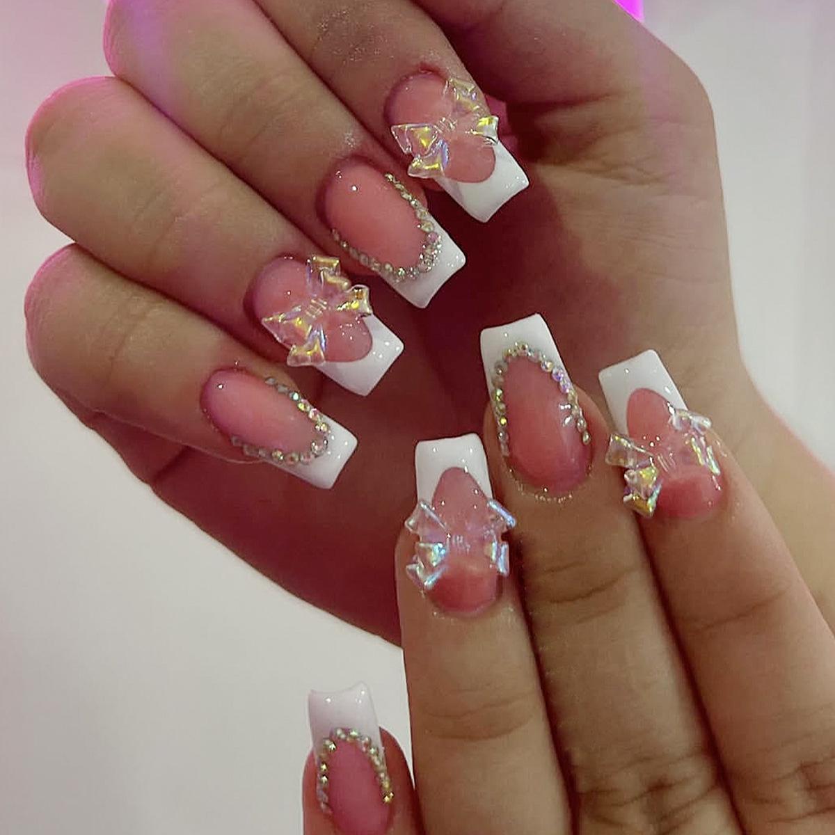 

Aurora Bow Rhinestone French Tip Removable White Fake Nails (Medium Rectangle)