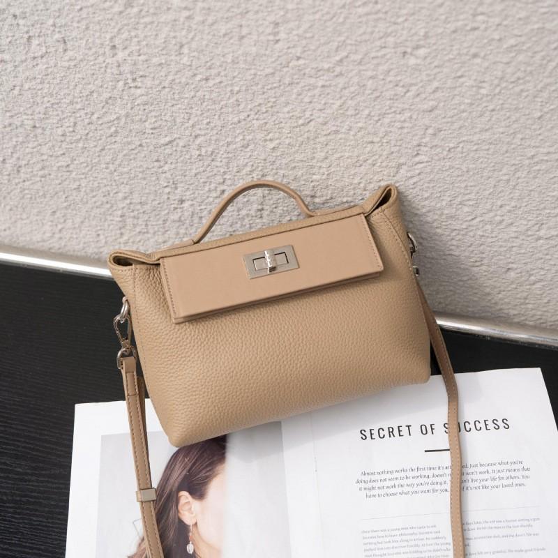 All-matching Retro Design Top-layer Cowhide 2026 Lock-up Fashionable Casual Commuting Portable One-shoulder Cross-body Bag