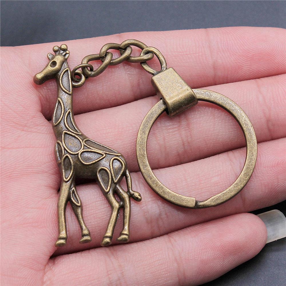 Dinosaur Animal Prehistoric Creature Pendant Antique Bronze Metal Keychain with 30mm Ring for Women High Quality