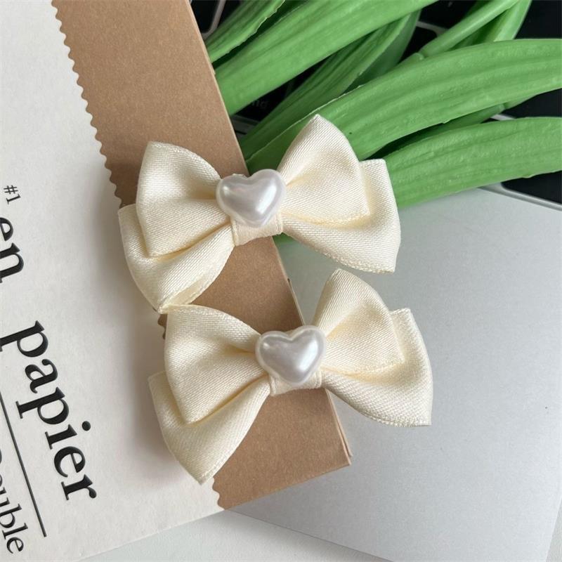 

Новые милые заколки для волос в форме сердца с бантом и жемчугом, модные украшения для волос, заколка для челки сбоку, заколка-уточка, заколки для волос, девчачьи аксессуары для волос в форме сердца бежевый