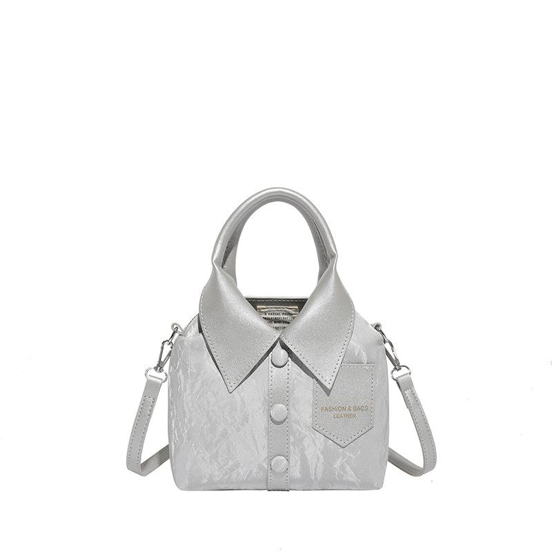 

Korean version of the new niche design single shoulder portable high-value shirt styling fashion trend personalized bag women срібний