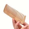 A Bamboo and Wood Hair Comb for Both Men and Women, Featuring A Wide-Toothed Design for Curling Hair and Grooming Beards