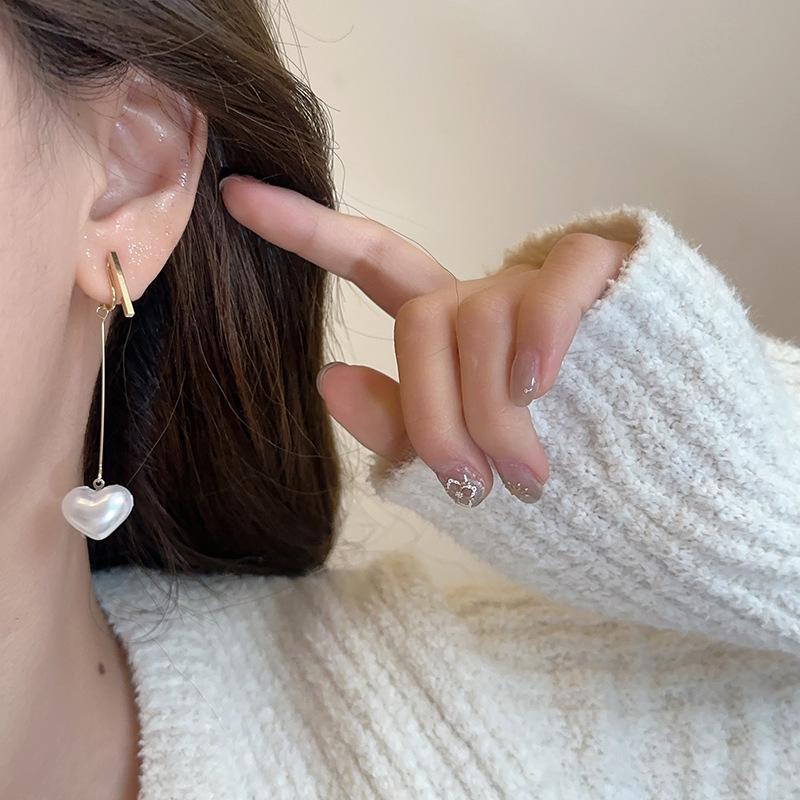 

Длинные серьги-подвески с имитацией жемчуга «Любовь», модные роскошные зажимы для ушей в виде противомоскитной катушки без отверстий для ушей