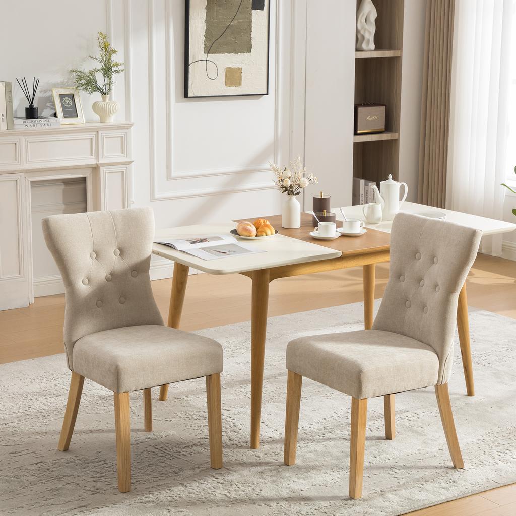 Modern upholstered dining chairs made of solid wood with chenille fabric cover, with wood legs and rivet decoration. 2 pieces per carton.-Beige