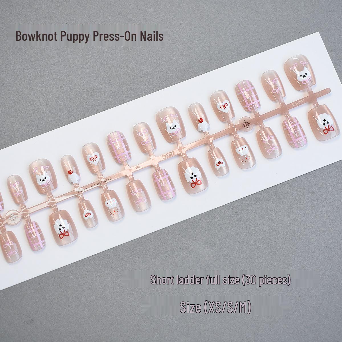 

30-Piece Striped Cat Eye Nail Art with Heart, Bow, Dog, Bear, and Gingham Designs