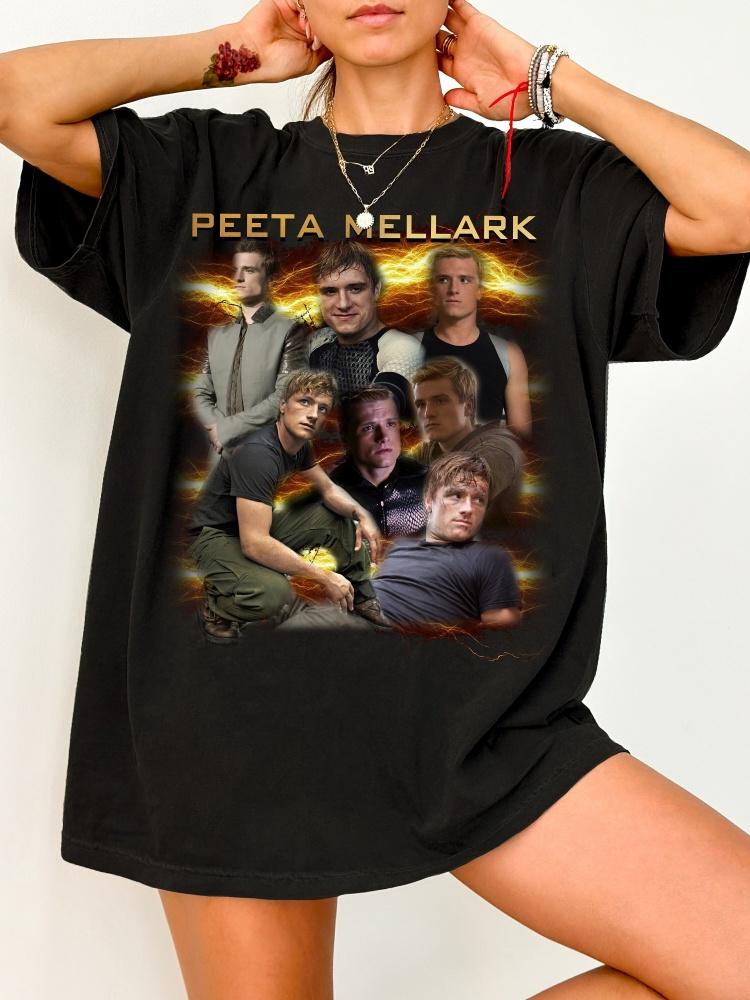 

The retro style Unisexs and Womens versatile Tshirt featuring Peeta Mellarks character in the Hunger Games merchandise series S