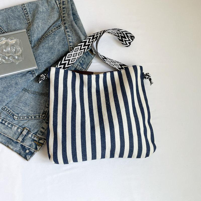 

Summer striped cloth bag high value lazy relaxation shoulder bag large capacity light leisure commuting shoulder bag women синій
