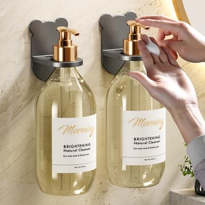 Portabottiglie universale per gel doccia Portabottiglie regolabile per shampoo Dispenser di sapone per le mani Gancio a parete Punzonatura gratuita