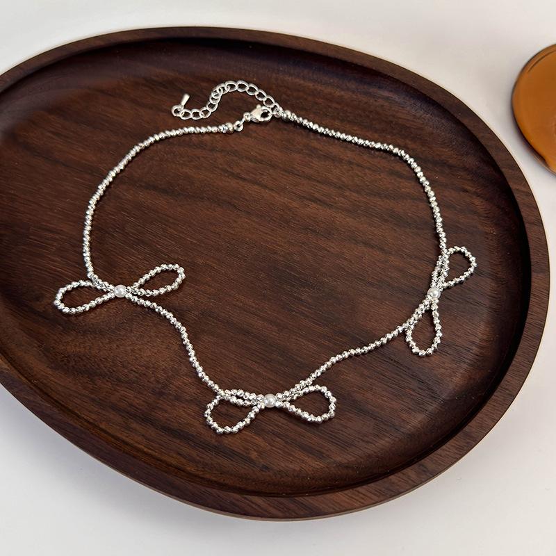 

Ожерелье с бантиком из темного кристалла Cool Wind, крутая цепочка на ключицу, дизайнерский аксессуар для женщин серебряный