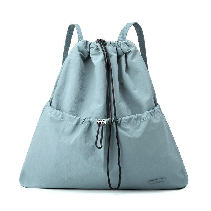 Niche daily leisure lightweight sports drawstring backpack commuter student schoolbag