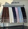 Fei Yuan Women's Ethnic Embroidered A-line Skirt: Autumn/Winter Fashion with Hollow Design