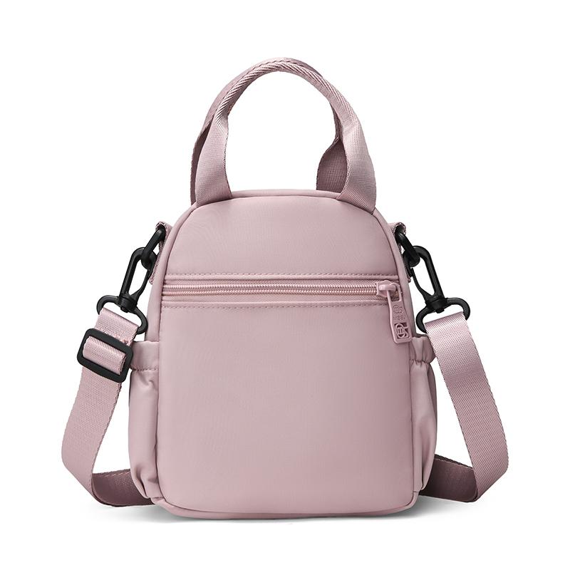 Kompakt Nylon Crossbody Miniryggsäck med Topphandtag Casual Liten Dagryggsäcksväska för Kvinnor Daglig Resa