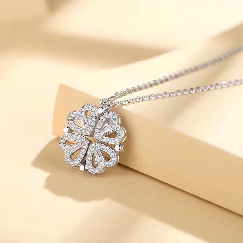 Fashionable women's four-leaf clover necklace with heart shape and full of diamonds; a versatile piece of jewelry that can be wo