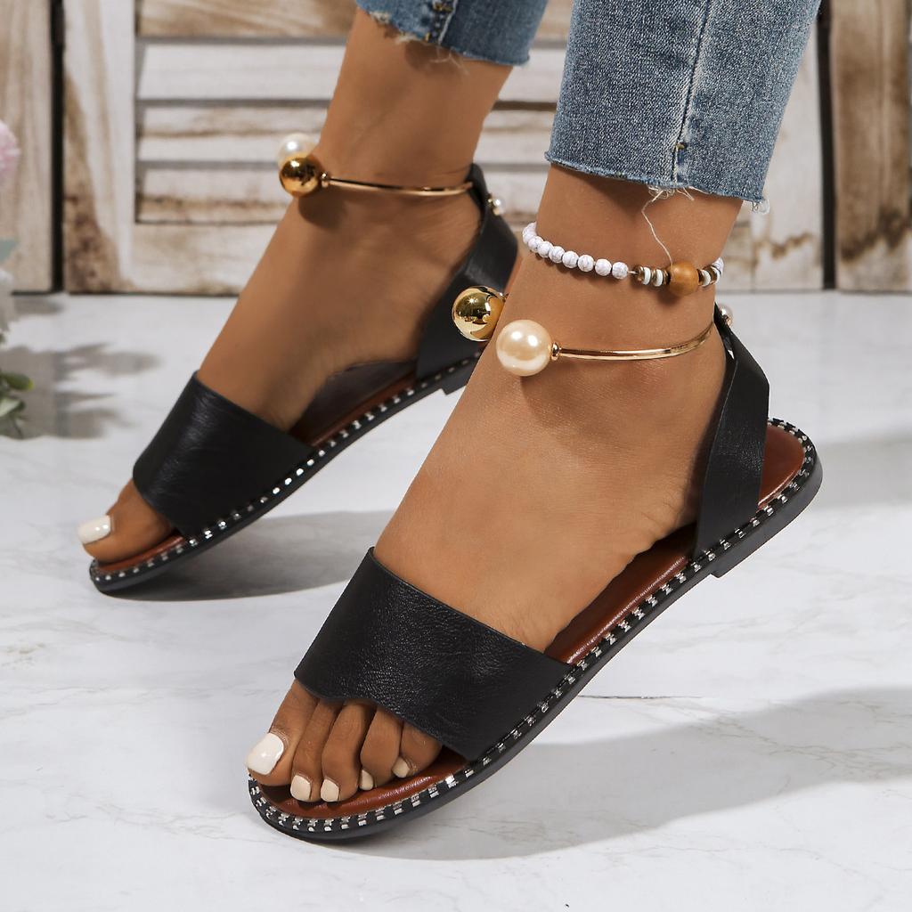 European and American one-word buckle flat sandals women's new open-toed simple pearl metal buckle cool slippers