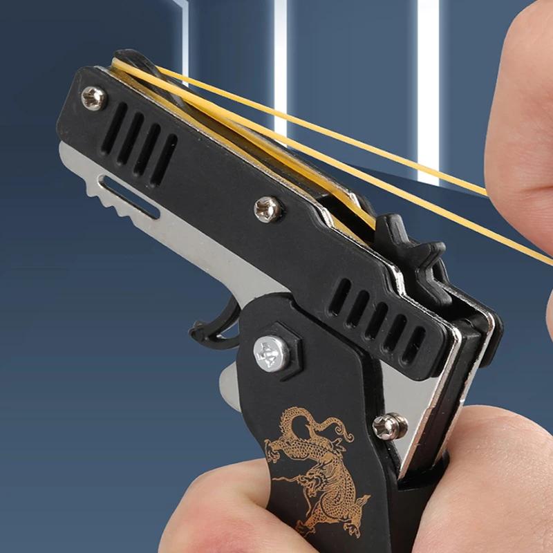 1PCs Elastic Leather Rubber Band Shooting Pistol Kid Outdoor Party Folding Toy Gun Soft Bullet Gun Keychain Fidget Toys