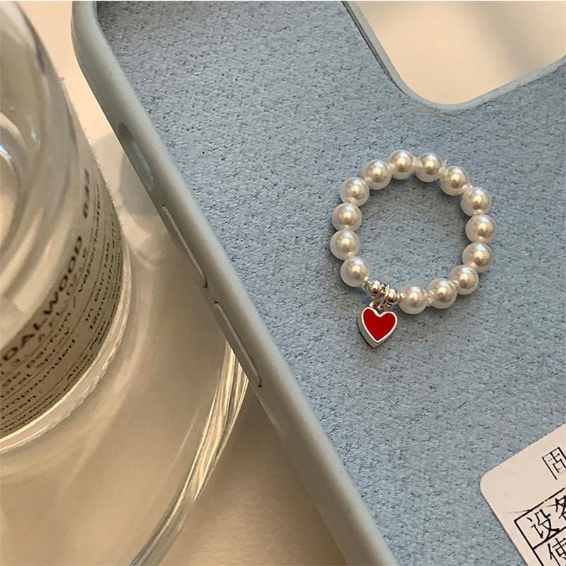 

Stylish Korean Heart-shaped Pearl Ring For Women With Elastic String Design 2023 J3917