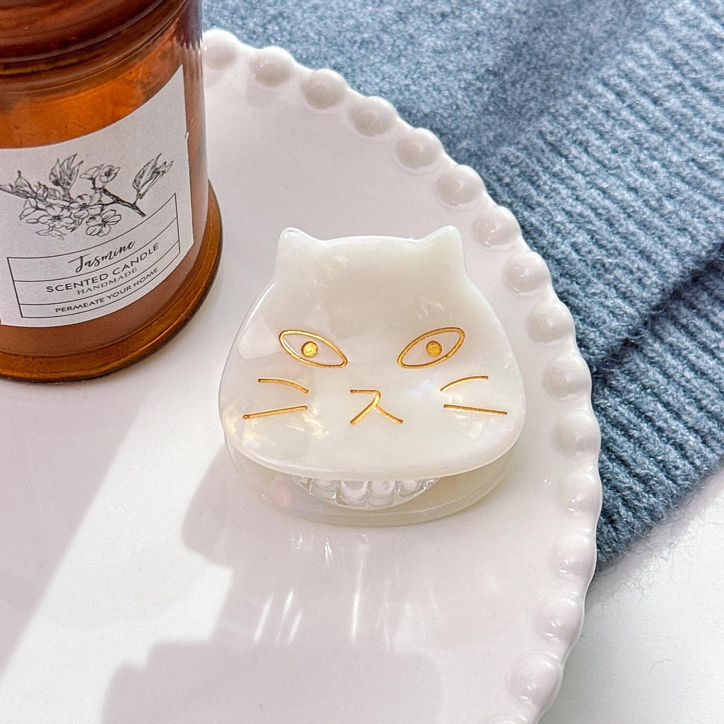Schattige haarclip in Japanse stijl met kattenmotief, gemaakt van acetaat, voor vrouwen, verkrijgbaar in zwart schildpadpatroon en diverse kleurrijke varianten.