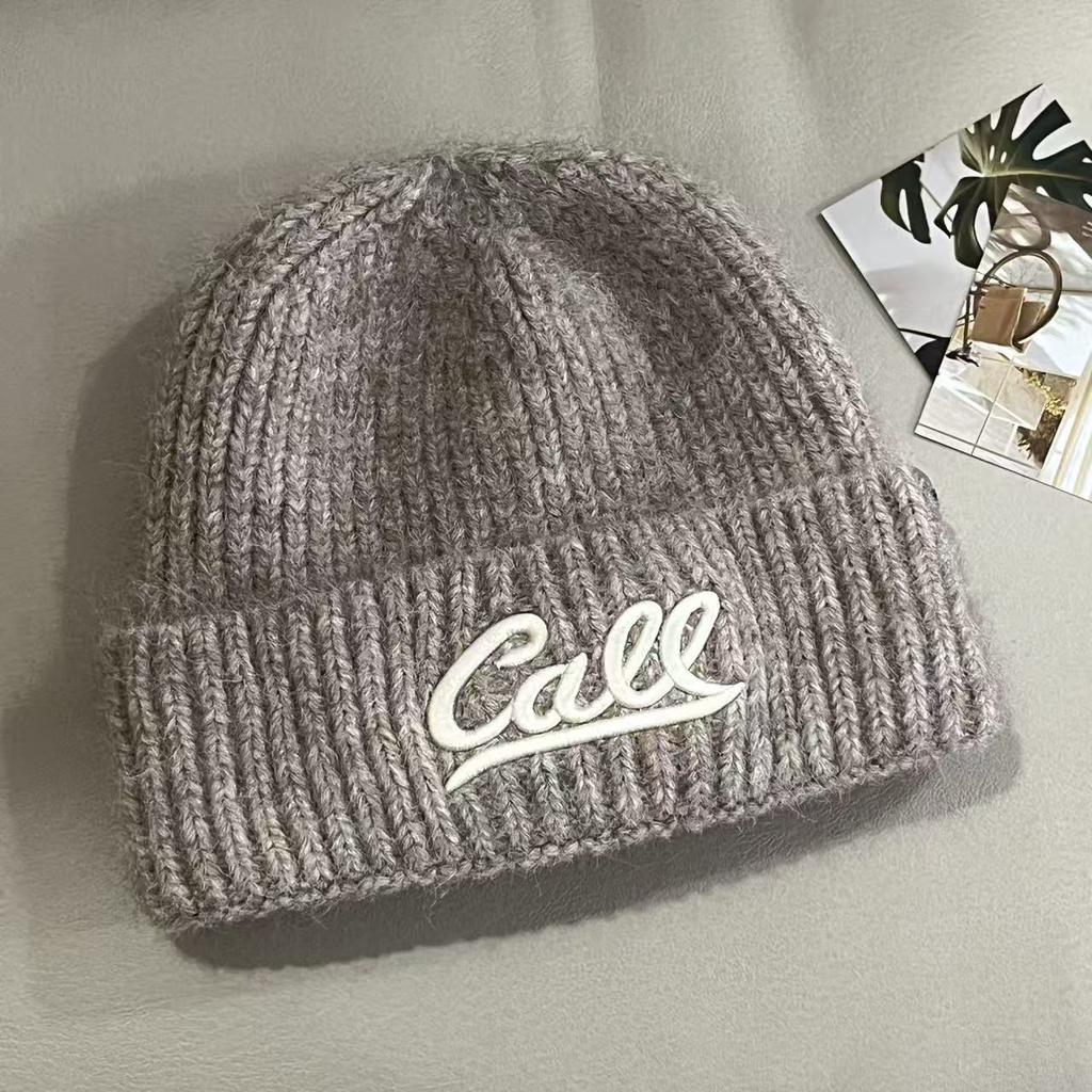 Autumn and winter new fashion letter embroidery knitted hat Korean version versatile solid color big head circumference shows the face small warm