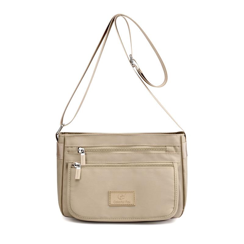 

Women s bag 2025 new trendy shoulder bag waterproof nylon bag multi-layer messenger bag Korean version versatile backpack абрикосовий