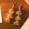 Three Layer Hollow Out Bell Tassels Bohemian Dangling Earrings Pair Made From Sturdy Alloy Versatile For Casual And Formal Wear