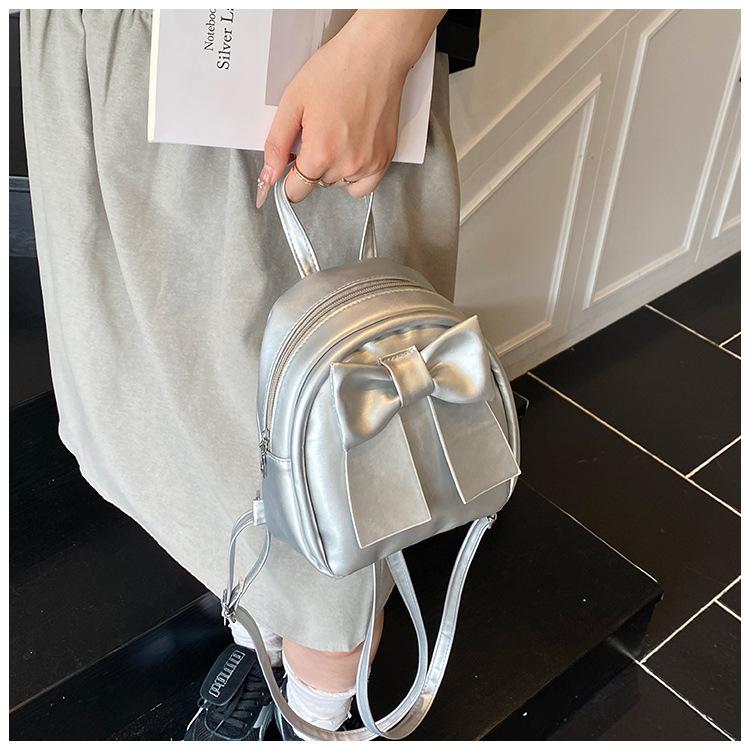 Sac à dos en cuir synthétique style coréen avec nœud papillon pour femme Sac à bandoulière matelassé léger