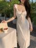 Women's Elegant White Spaghetti Strap Backless Summer Dress 2026 - Long, Beautiful Beach Photo Shoot Fairy Style