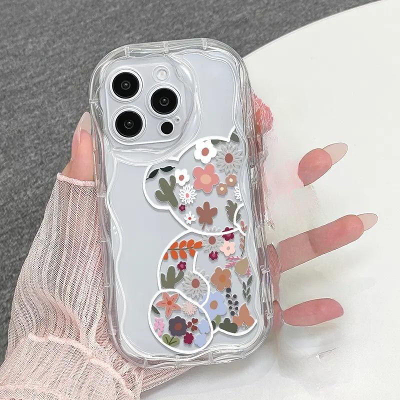 Vibrant flower bear is suitable for Apple 16promax mobile phone case, transparent iPhone17 airbag anti-drop protective case.