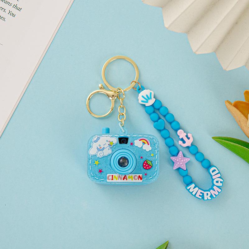

Подвеска-фотоаппарат с проектором Sanrio: Разноцветный брелок-слайдшоу с игрушечной камерой для маленьких девочек