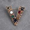 Retro temperament design sense hollow victory V-shaped brooch