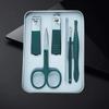 Nail Care Gift Set: Portable Tin Box with Clippers, Scissors, Tweezers, and Ear Spoon
