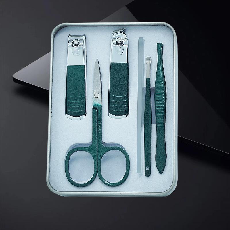 Nail Care Gift Set: Portable Tin Box with Clippers, Scissors, Tweezers, and Ear Spoon