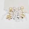 Pearl Bow Heart Keychain 3D Bag Charm Ornament In Gold/Silver