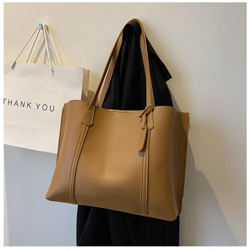 

Autumn and winter big bag women s 2 new trendy simple large-capacity soft leather tote bag casual versatile shoulder bag светло-коричневого