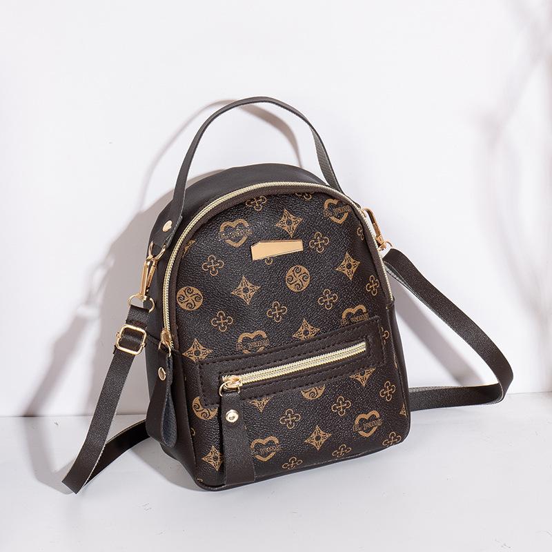 

Retro printed double shoulder women s bag bag light luxury large capacity texture small backpack темно-коричневого