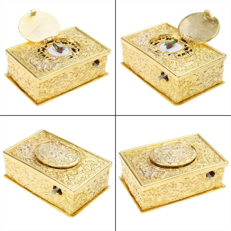 Antiker Gesangsvogel-Schmuck aus Legierung mit geprägtem Engelsmuster Mechanische Spieluhr für Schreibtisch Regal Display Geschenk