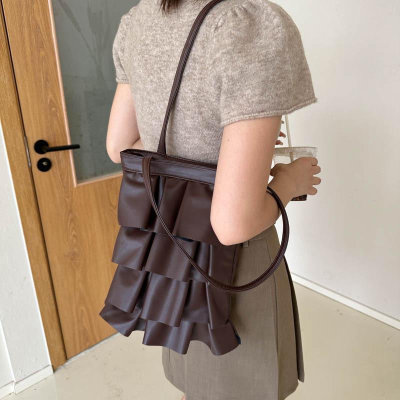 Leisure commuter shoulder bag niche foreign style bucket bag 2024 autumn new bag women's fashion simple handbag