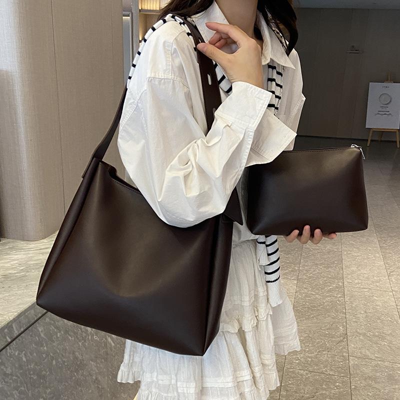 Spring simple style casual solid color wide shoulder strap mother and child bag commuting versatile niche design women's shoulder bag