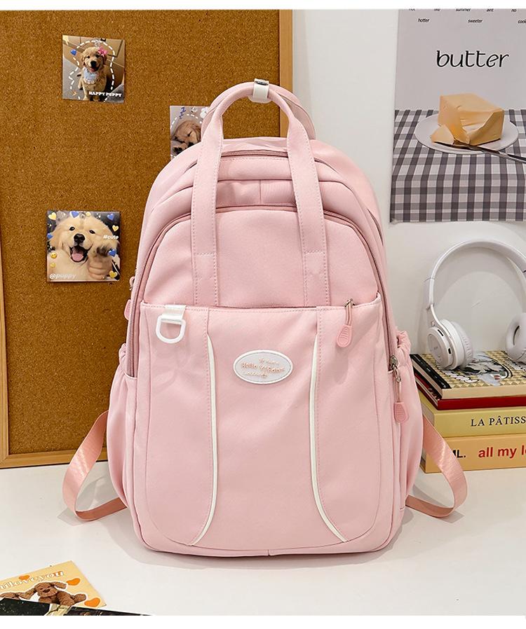 

School bag Korean version candy color simple large capacity 3-6 grade school bag waterproof lightweight versatile backpack leisure travel bag
