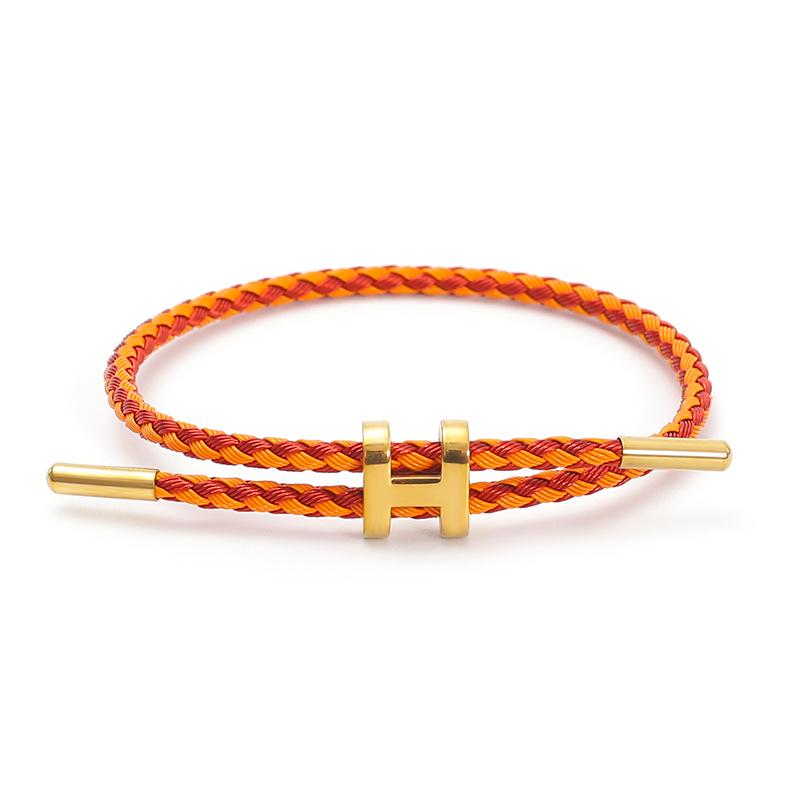 

Регульований браслет з нержавіючої сталі 3D твердого золота та мотузки з титановим водонепроникним браслетом